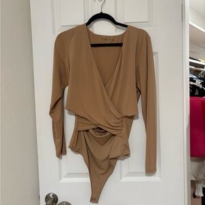 Tan crossover bodysuit
